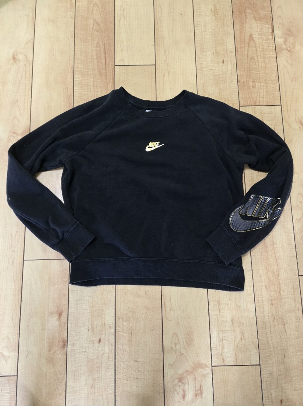 Nike Womans Black Crewneck Sweatshirt with Gold Logo